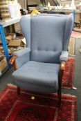 Two mid 20th century blue upholstered armchairs