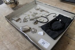 A collection of silver and white metal jewellery, miniature pill boxes,