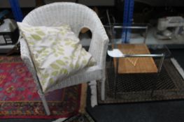 A wicker armchair and a metal and wicker side table