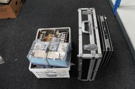 Two metal bound cases together with a box containing cassette tapes,