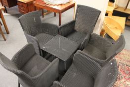 A six piece conservatory set comprising of table and five chairs