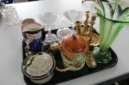 A tray of brass candlesticks, cocktail glasses,