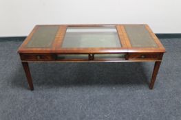 A reproduction glazed mahogany display table