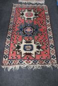 A Caucasian design rug,