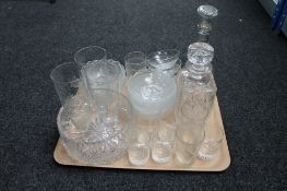 A tray of cut crystal and glass - decanters,