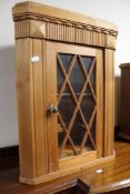 A pine corner display cabinet