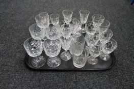 A tray of cut crystal glasses of various design