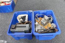 Two boxes containing Kodak carousel, cine camera,