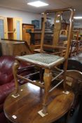 An early twentieth century walnut bedroom chair
