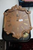 A 20th century continental oak wall clock,