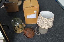 Three ornamental decorative table lamps together with a cow bell