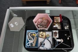 A tray of various silver and costume jewellery