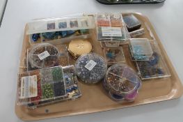 A tray of hobby craft beads etc
