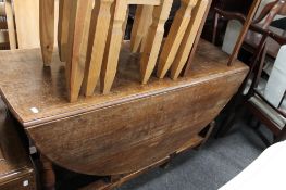 An oak gateleg table