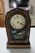 A 19th century lacquered wooden mantel clock