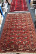 An Afghan Tekke rug, 121cm by 188cm (a/f) CONDITION REPORT: Torn in one area.