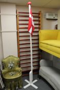 A flag on white pole
