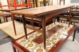 A mid century Danish coffee table CONDITION REPORT: 145cm long by 55cm deep by 56cm