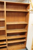 A set of teak bookshelves