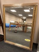 A golden framed mirror