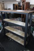 A painted rustic bookshelf CONDITION REPORT: 122cm wide by 31cm deep by 117cm high.