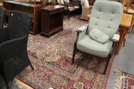 A fringed Persian carpet