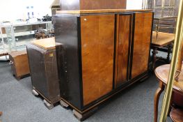 A two tone mid century double door side cabinet