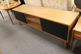 A light oak contemporary sideboard