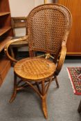 Two wicker armchairs
