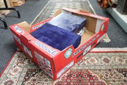 A box containing boxed set of goblets, dinner plates,