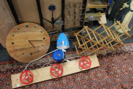 An ornamental coat rack, drying rack,