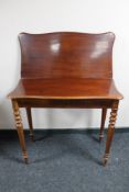 A nineteenth century mahogany tea table