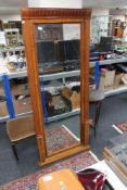 A large rectangular mahogany framed bevelled mirror