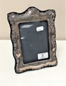 A silver easel photograph frame, height 21.5 cm, London marks.