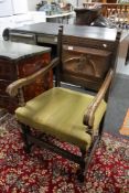 A continental carved oak armchair