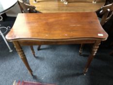 A nineteenth century mahogany tea table CONDITION REPORT: Legs rather wobbly.