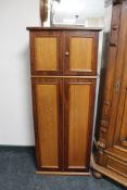 A mahogany double door side cabinet