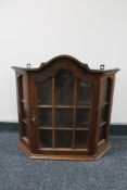 An oak display cabinet