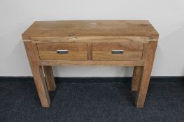 A Sheesham wood two drawer side table