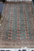 A Tekke design rug on mint ground,