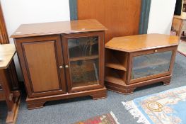 A contemporary corner TV stand with matching audio cabinet