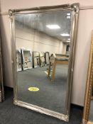 A silvered swept mirror