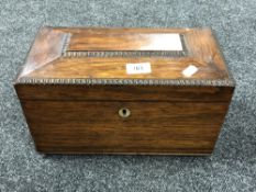 A Victorian rosewood tea caddy