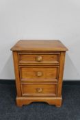 A contemporary pine three drawer chest