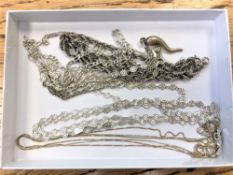 An Italian three-tone silver necklace, four other silver necklaces and a pendant on chain.