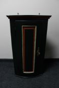 A nineteenth century stained pine corner cabinet