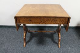 A nineteenth century mahogany flap sided sofa table CONDITION REPORT: Small loss to