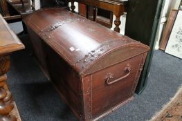 A nineteenth century stained pine dome topped trunk