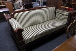 A nineteenth century inlaid mahogany settee
