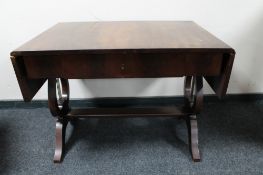 A mahogany flap sided sofa table fitted a drawer